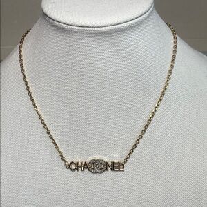 CC Stamped Charm Gold Necklace with Crystal Logo